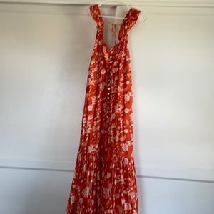 Orange maxi dress. Not branded. Frilly sleeves . Button up front and tassels